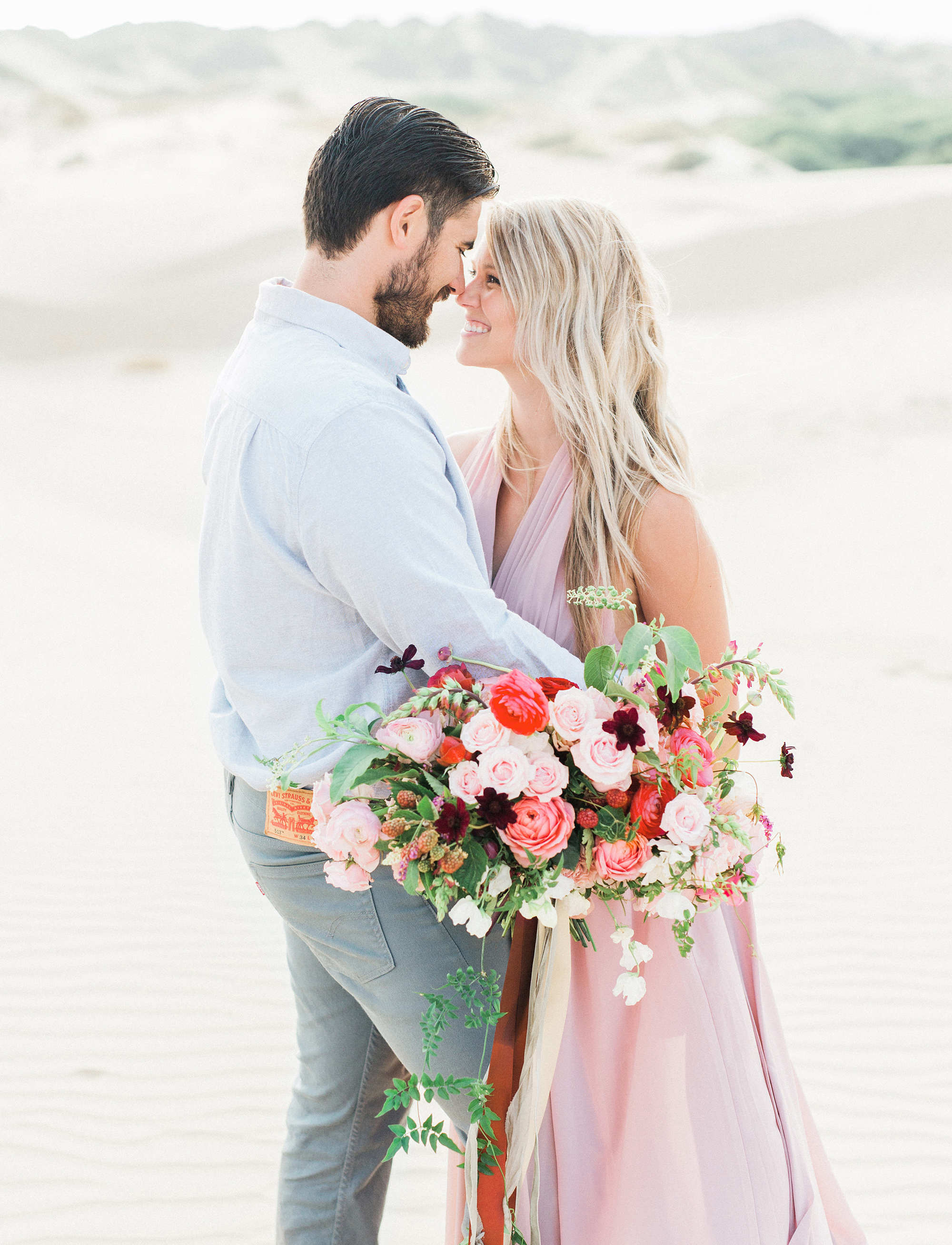 Sand dunes engagement session from Santa Barbara wedding photographer Tenth & Grace.