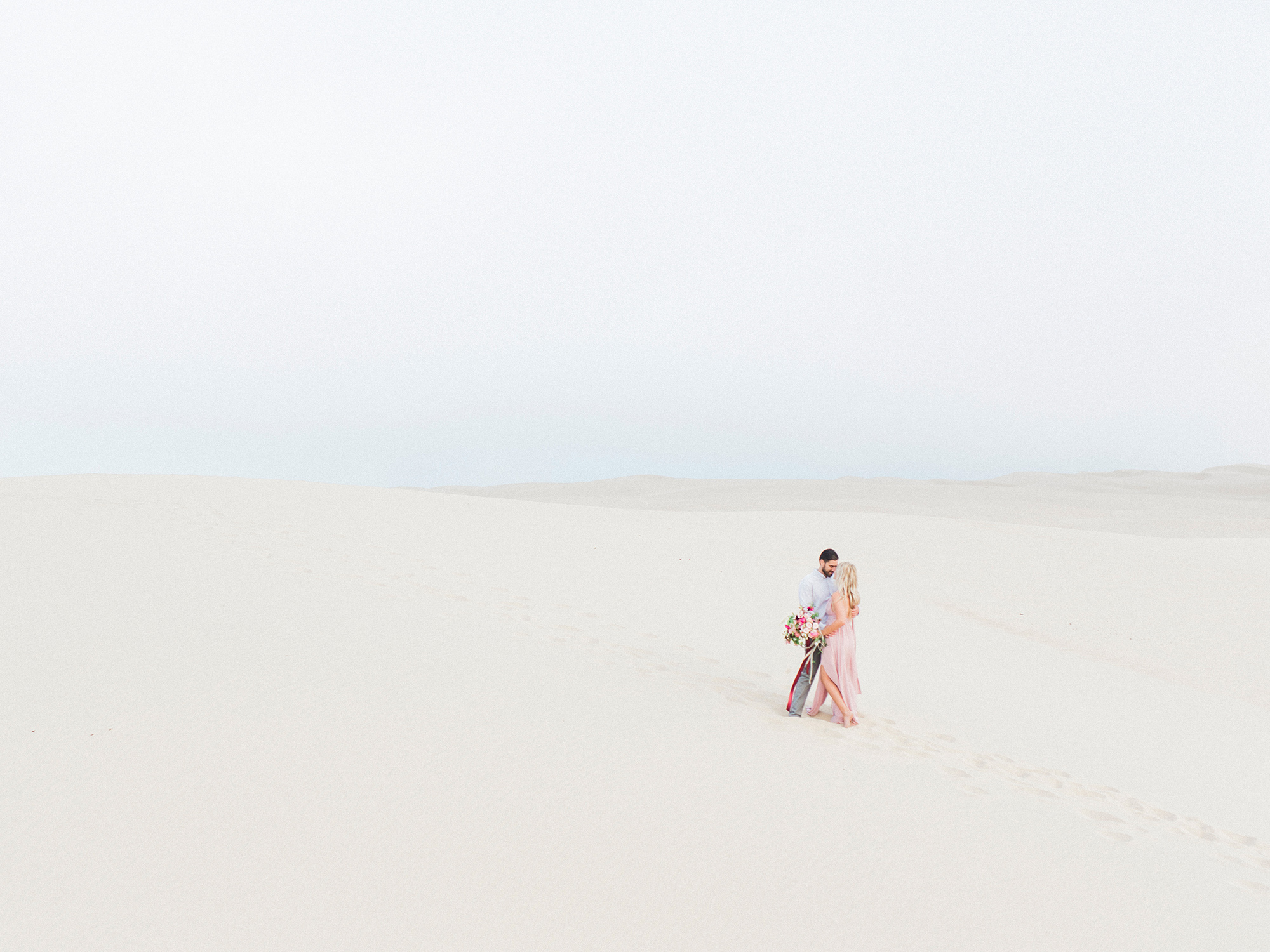 Sand dunes engagement inspiration by Santa Barbara wedding photographer Tenth & Grace.