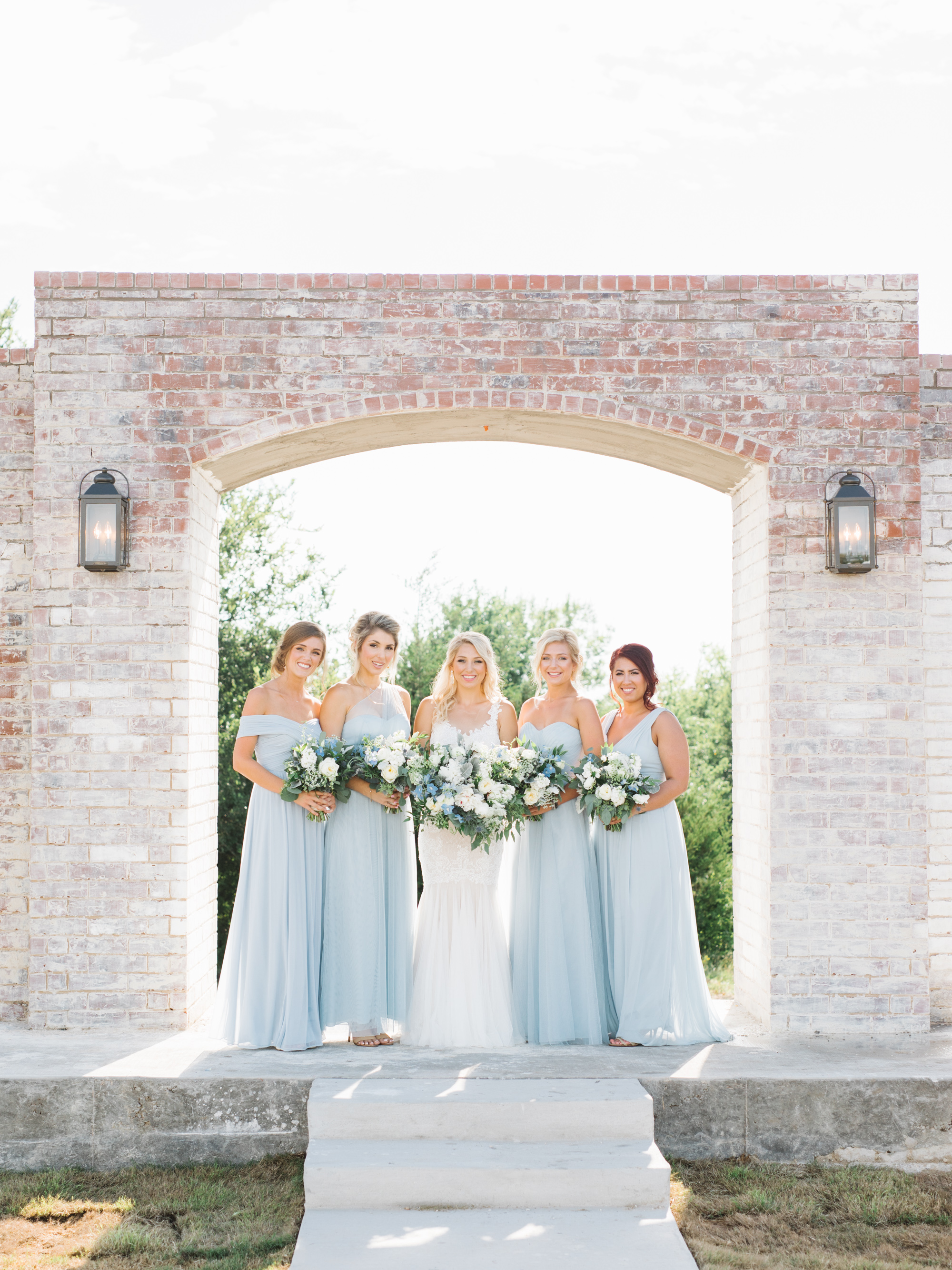 Bridesmaids in light blue at The Grand Ivory